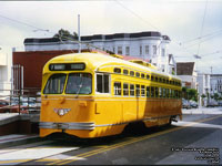 San Francisco Muni 1052 Los Angeles Railway Yellow Car (NCL) livery PCC streetcar built in 1948 - Ex-Philidelphia Transportation Company 2110 via SEPTA - F Market & Wharves line